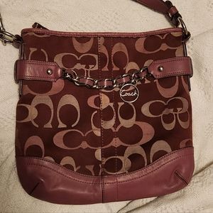 Coach signature raspberry/purple color. Shoulder or crossbody.